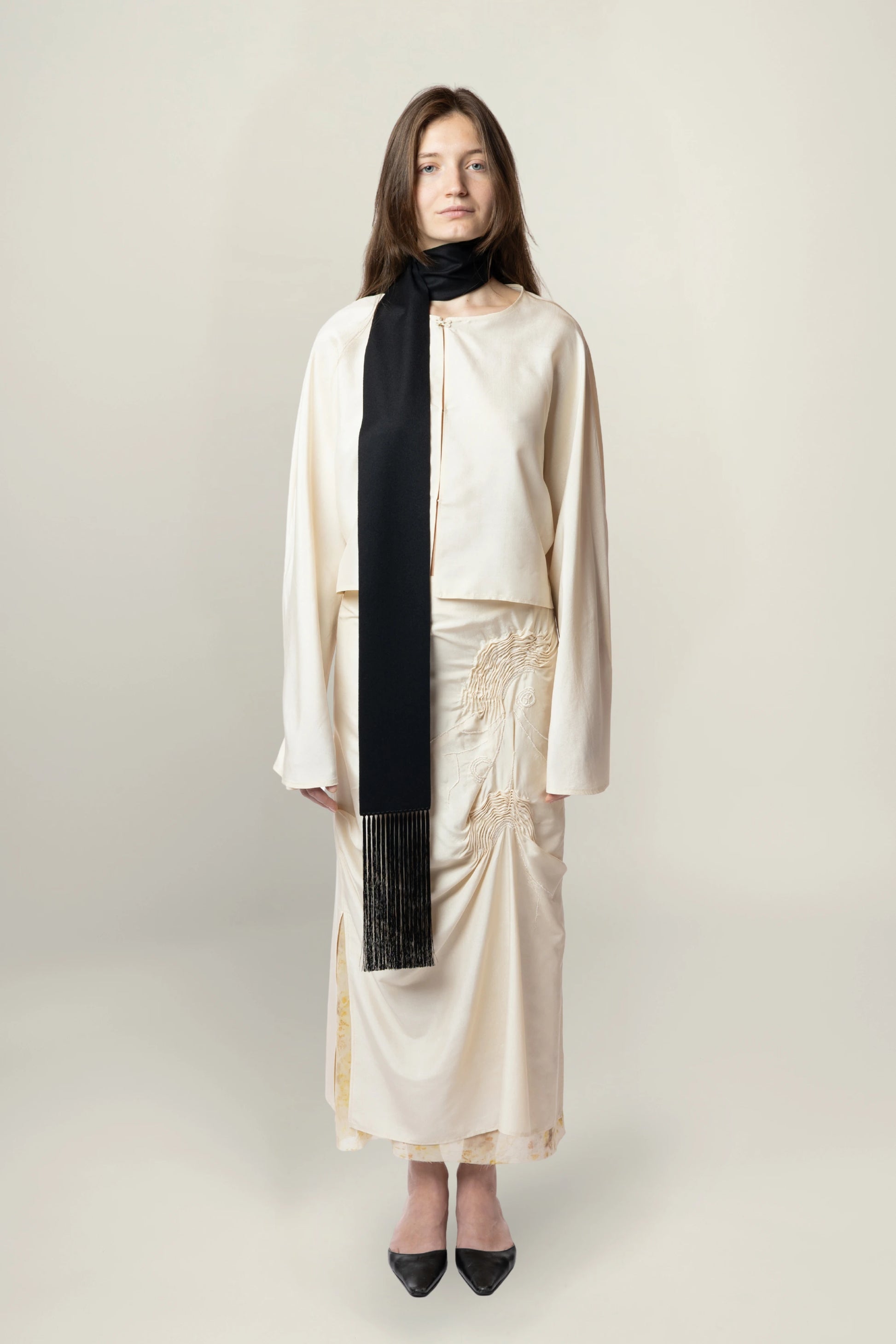 Brisa Slim Scarf - Black | MAISON MAGDALENA  | A slim scarf made of wool and cashmere with a handmade fringe detail | product picture