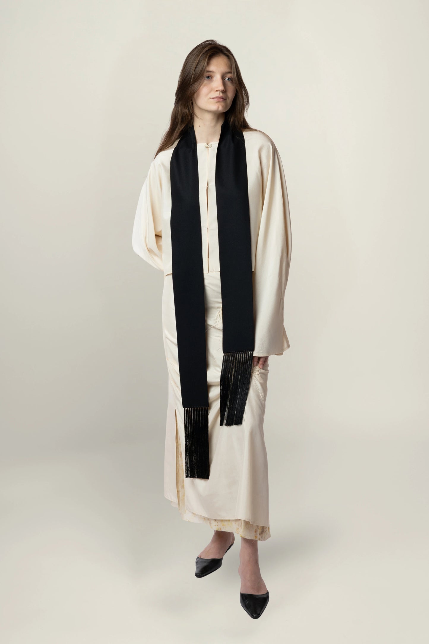 Brisa Slim Scarf - Black | MAISON MAGDALENA  | A slim scarf made of wool and cashmere with a handmade fringe detail | product picture