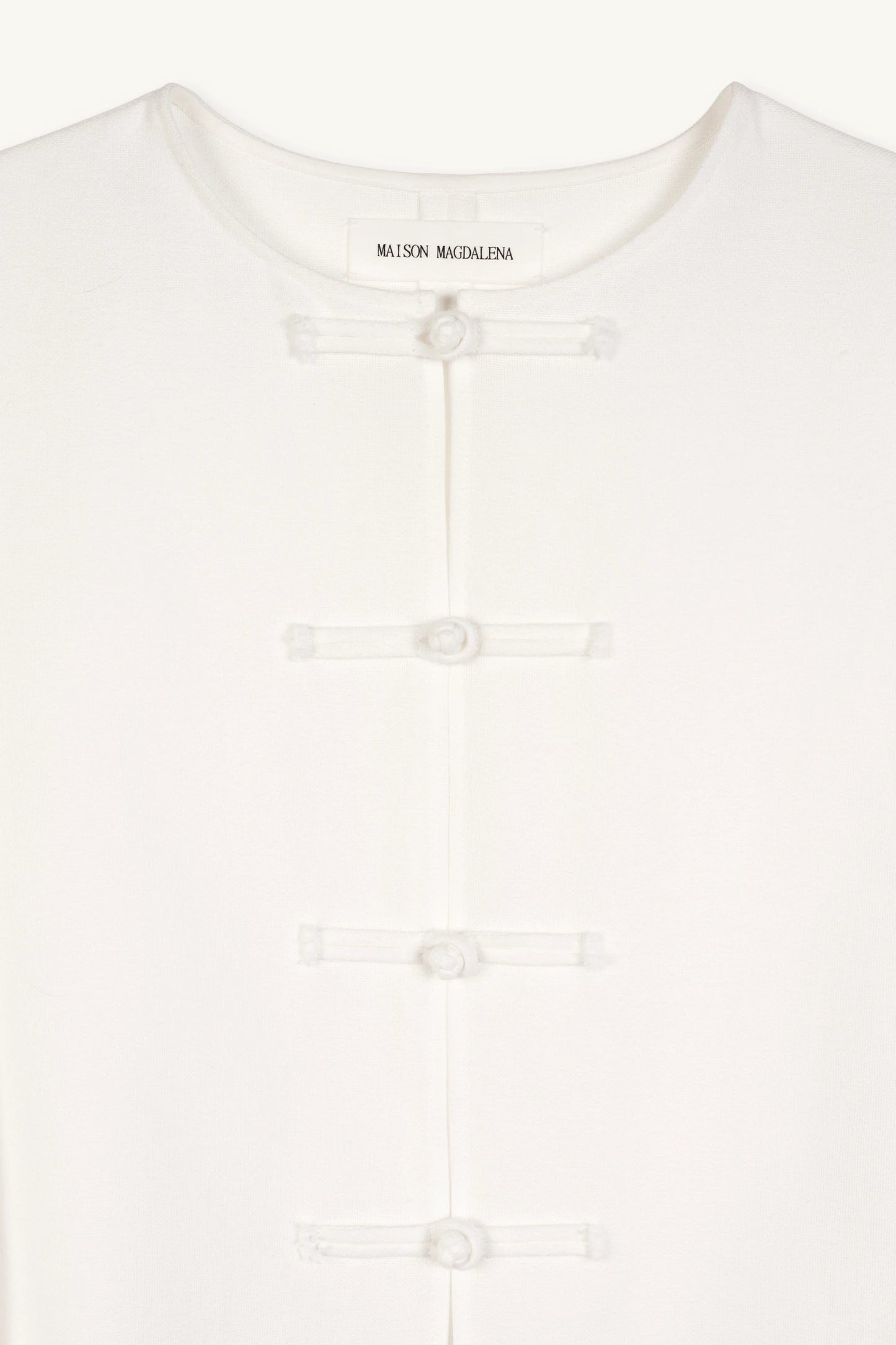 Cruise Top | MAISON MAGDALENA | White top with handmade frog buttons | Product picture close up