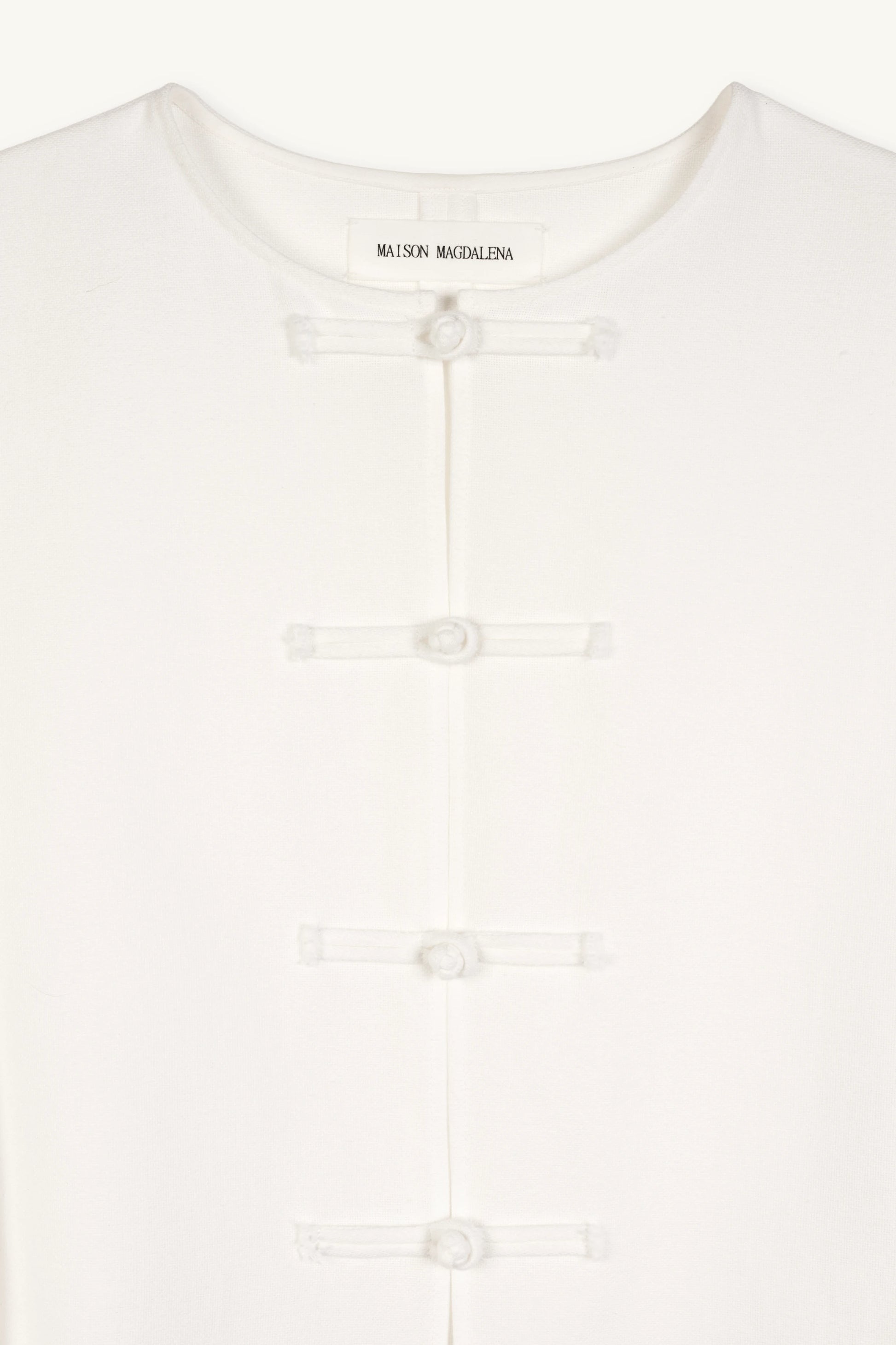 Cruise Top | MAISON MAGDALENA | White top with handmade frog buttons | Product picture close up