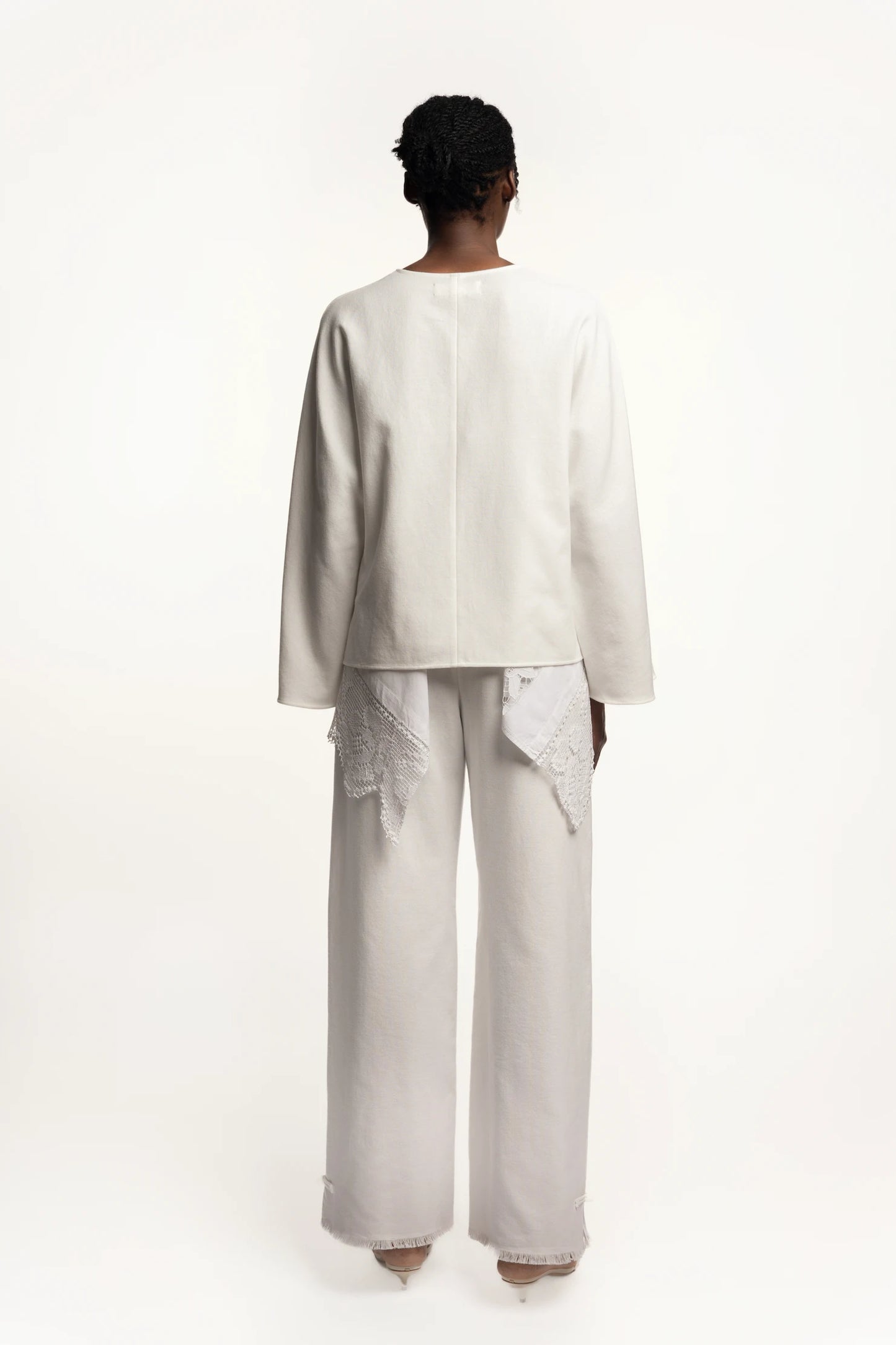 Cruise Top | Cruise Trousers | MAISON MAGDALENA | White top with handmade frog buttons | Model picture full body back view