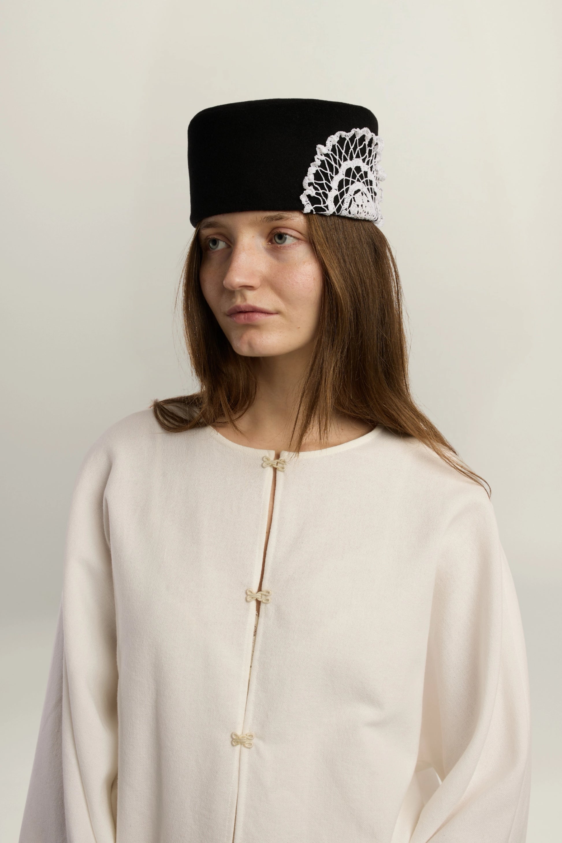 Cruise Top | MAISON MAGDALENA | White top with four hook and eye closures | Model picture front view