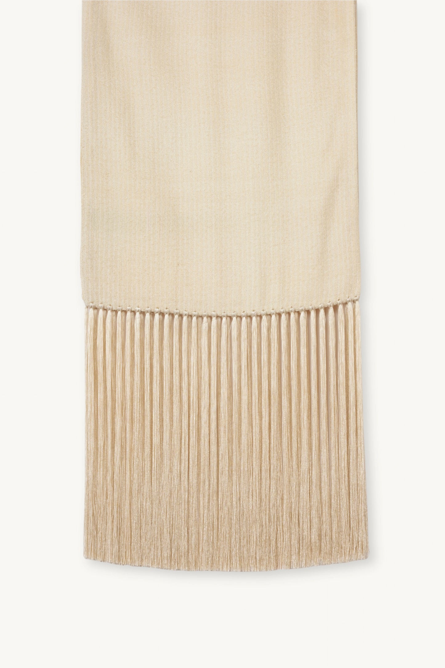 Linea Scarf | MAISON MAGDALENA | A beige long scarf with a handmade fringed finish | Product picture