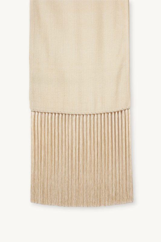 Linea Scarf | MAISON MAGDALENA | A beige long scarf with a handmade fringed finish | Product picture