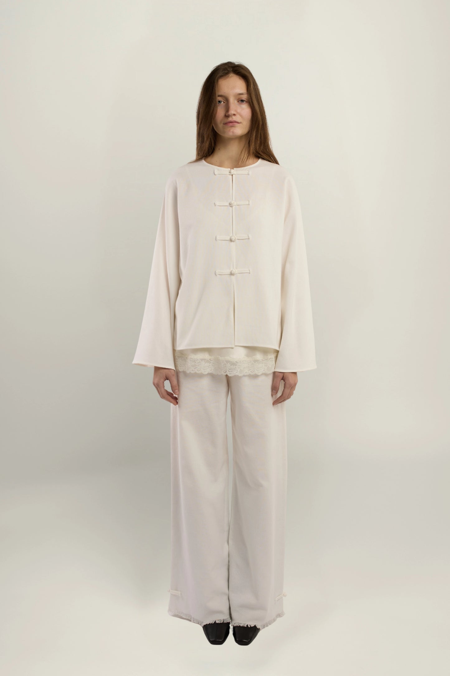 Cruise Top | MAISON MAGDALENA | White top with handmade frog buttons | Model picture front view full view