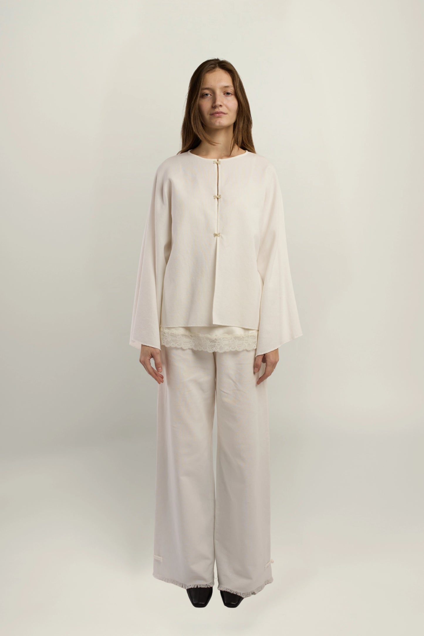 Cruise Top | MAISON MAGDALENA | White top with four hook and eye closures | Model picture front view