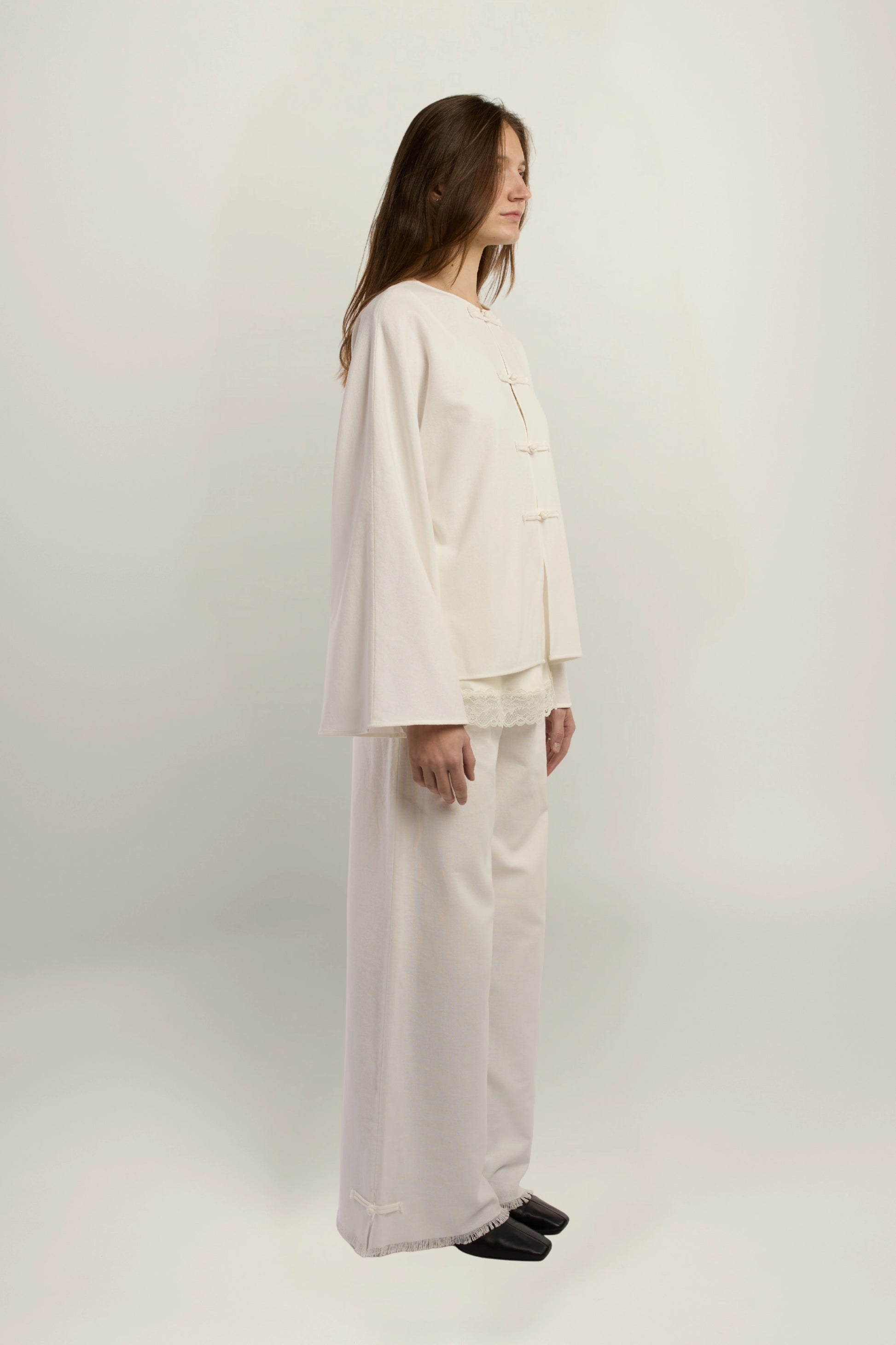 Cruise Top | MAISON MAGDALENA | White top with handmade frog buttons | Model picture lateral view