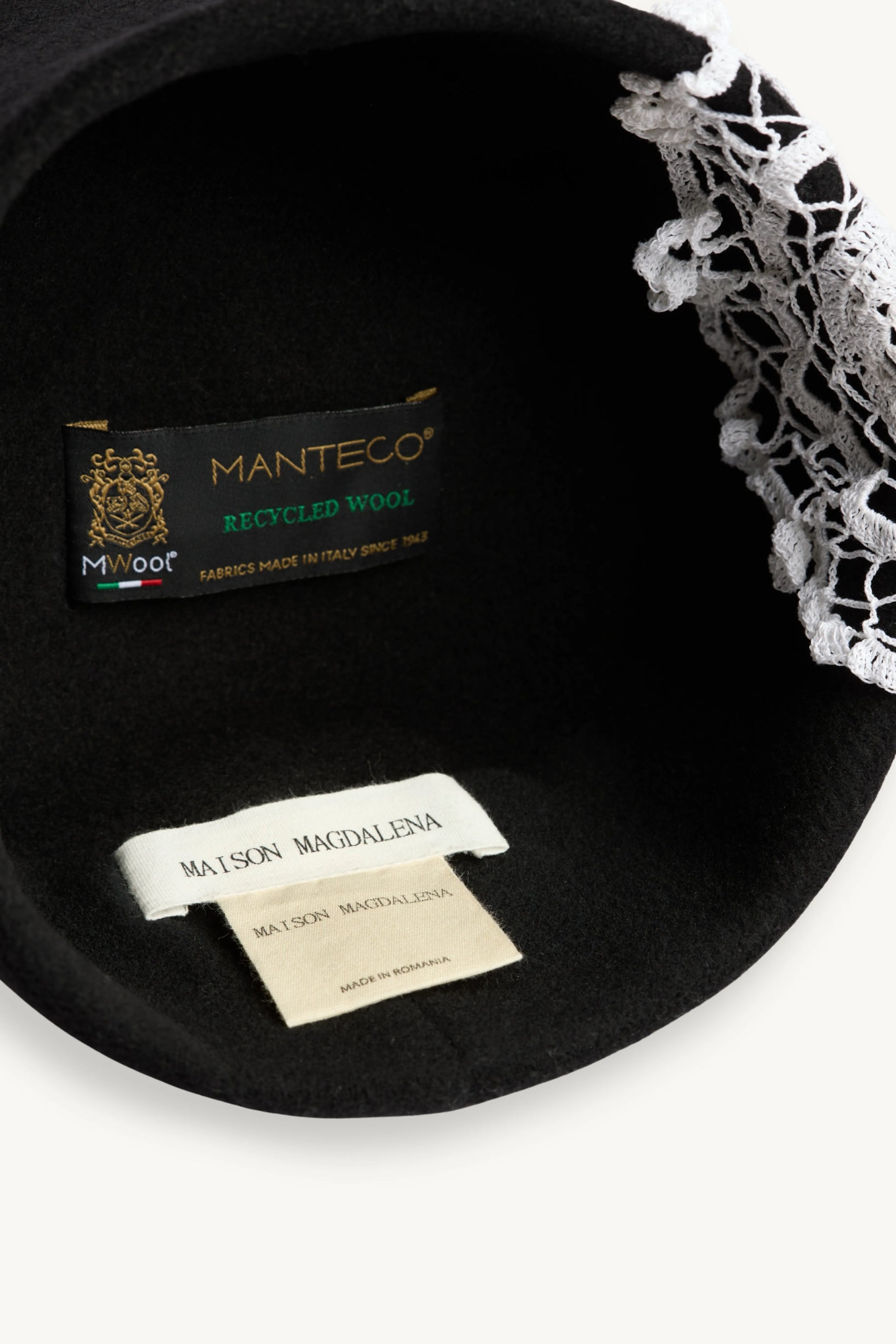 Ornis Hat | MAISON MAGDALENA | Black pillbox hat with a hand crocheted white flower on the side | Product picture detail inside 